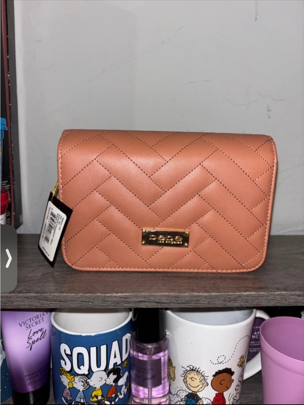 bebe Quilted Peach Crossbody with Gold Logo Plaque